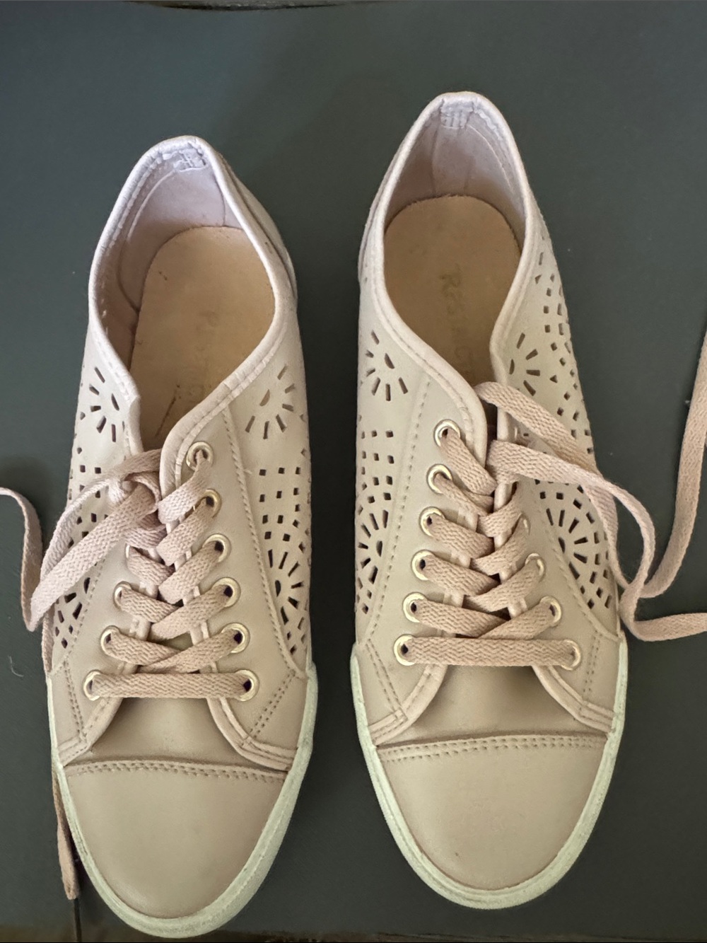 Light pink leather-like woman’s shoes